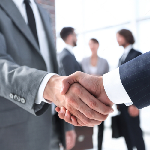 stock-photo-closeup-reliable-handshake-of-business-partners-1842437908-transformed.png